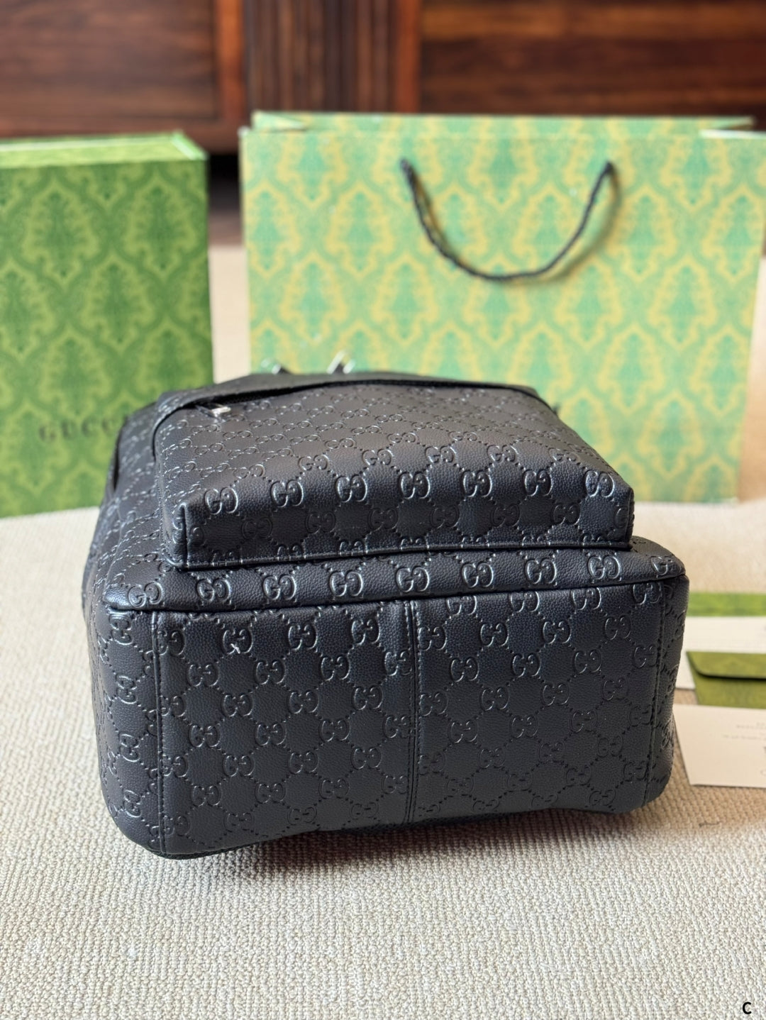 GG Embossed leather backpack 1825052304