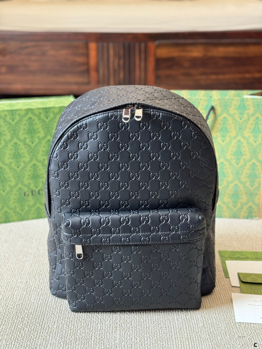 GG Embossed leather backpack 1825052304