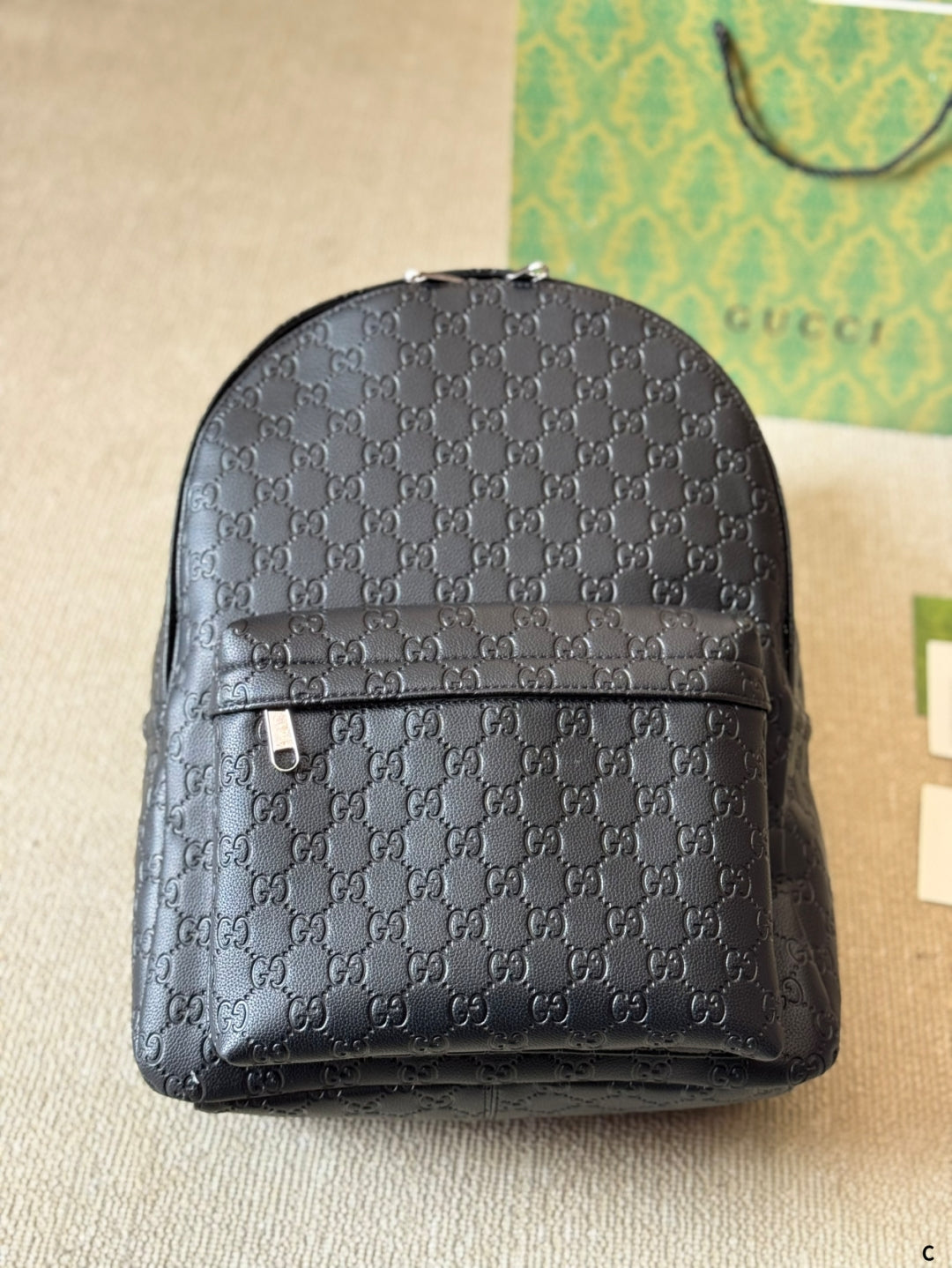 GG Embossed leather backpack 1825052304
