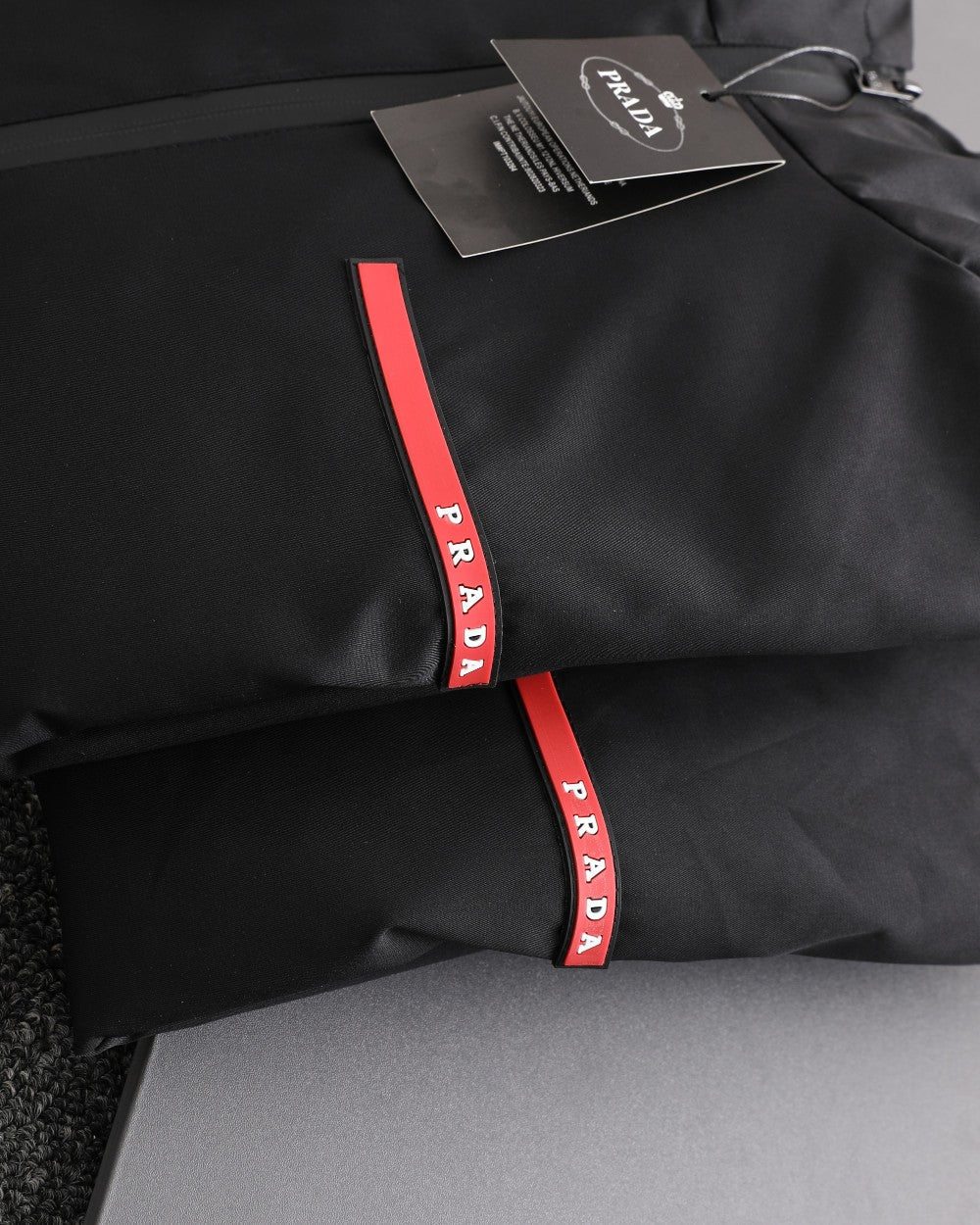 PR Triangular logo red tape hooded jacket 1824100701