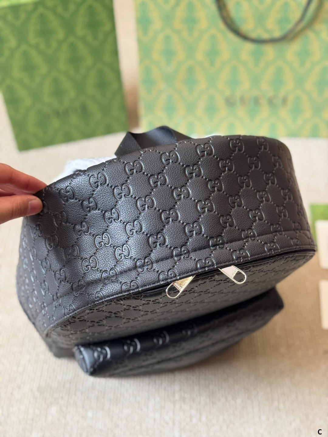 GG Embossed leather backpack 1825052304